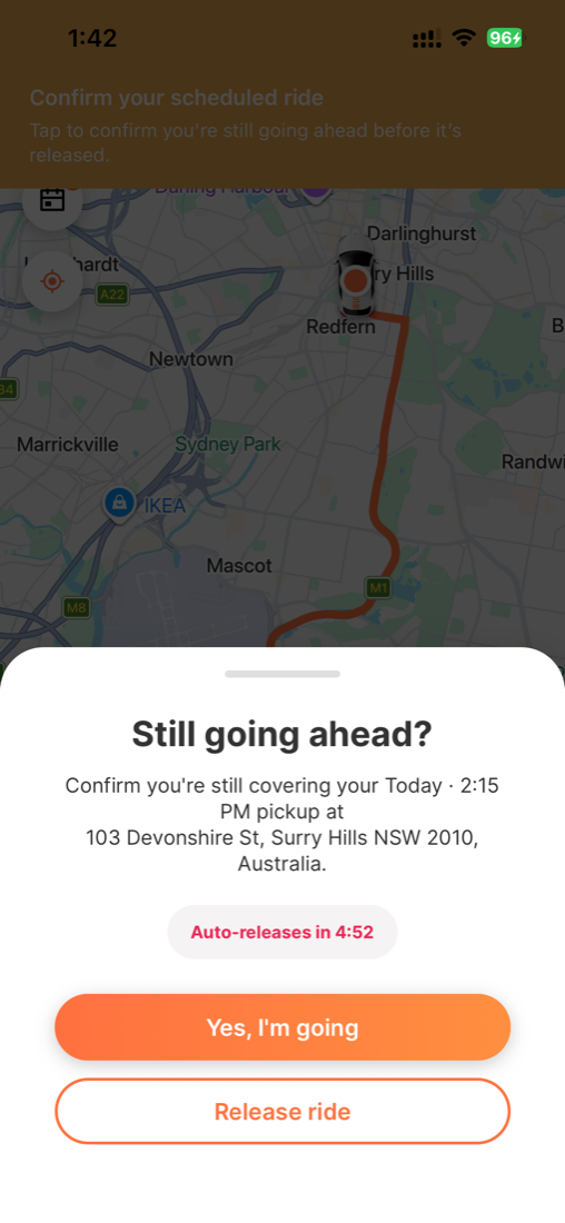 In-app sheet titled 'Still going ahead?' confirming the 2:15 PM pickup, with an 'Auto-releases in 4:52' timer and Yes I'm going / Release ride buttons.