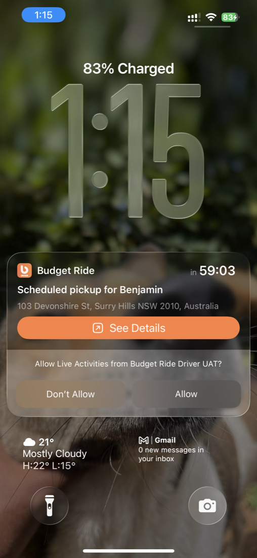 Lock screen notification from Budget Ride: Confirm pickup for Benjamin at 2:15 PM, with a Confirming button.